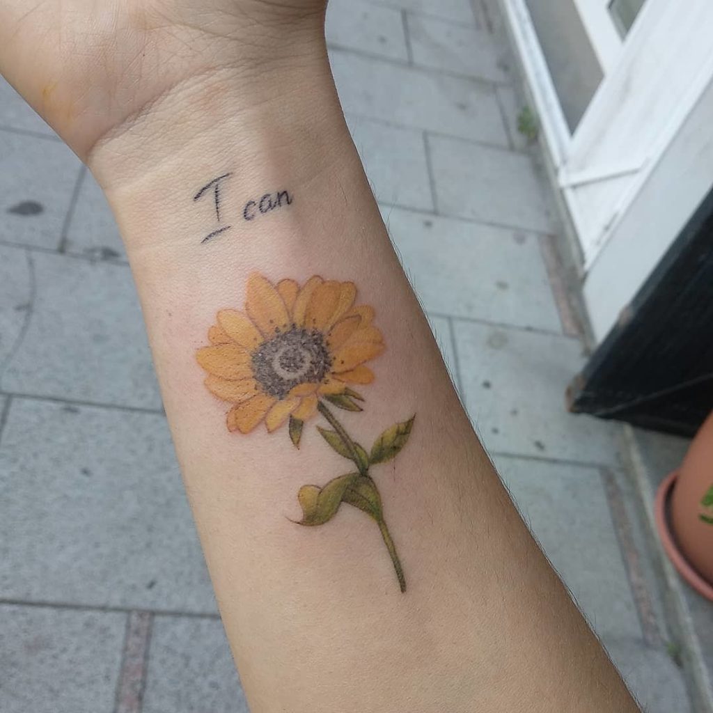 tatuaje girasol frase