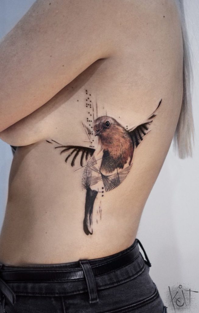 tatuajes costilla pajaro